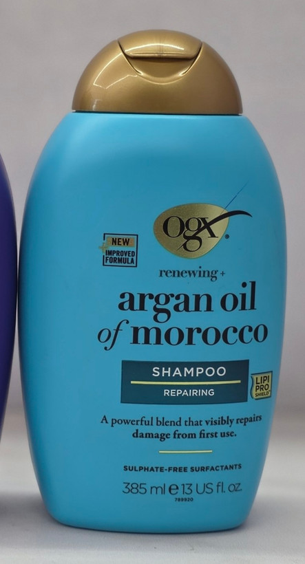 شامپو مغذی و تقویت کننده Ogx Argan Oil Of Morocco حاوی روغن آرگان مراکشی مناسب انواع مو حجم 385 میل اصل اورجینال ( واردات قانونی از منطقه آزاد ارس )