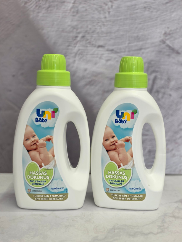 مایع شستشوی لباس کودک 1.5 لیتری یونی uni درب سبز اصل اورجینال ( واردات قانونی از منطقه آزاد ارس )