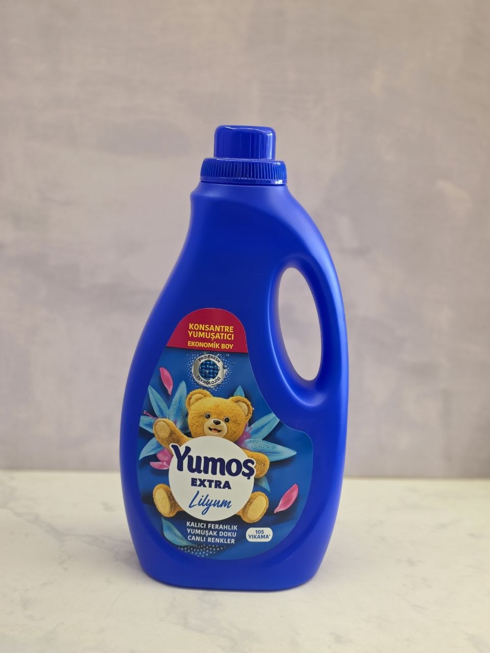 مایع نرم کننده یوموش اکسترا Yumoş Extra آبی با رایحه گل لیلیوم حجم 2520 میل اصل اورجینال ( واردات قانونی از منطقه آزاد ارس )