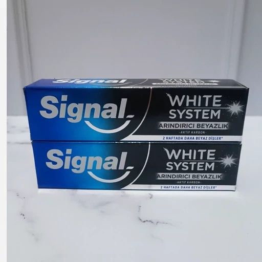 خمیر دندان زغالی سفید کننده سیگنال Signal سری وایت سیستم white system ( از بین برنده آلودگی و کثیفی دندان) اصل اورجینال ( واردات قانونی از منطقه آزاد ارس )