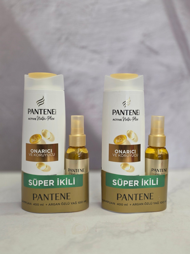 پک مراقبت شامپو و روغن مو پنتن Pantene ترمیم کننده آرگان 400 + 100 میل اصل اورجینال ( واردات قانونی از منطقه آزاد ارس )